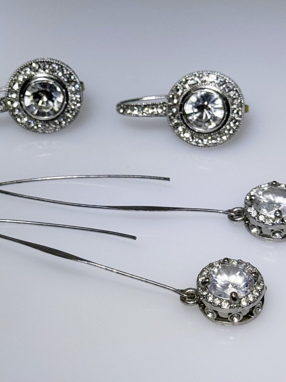 2 sets silver tone crystal earrings